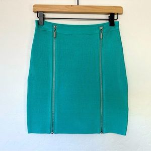 NWT BEBE Bandage Zipper Mini Skirt. Size: Small. Excellent condition